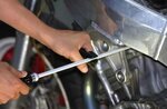Angle conducteur pour moto carburateur