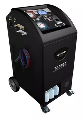 Appareil de service de climatisation a double gaz